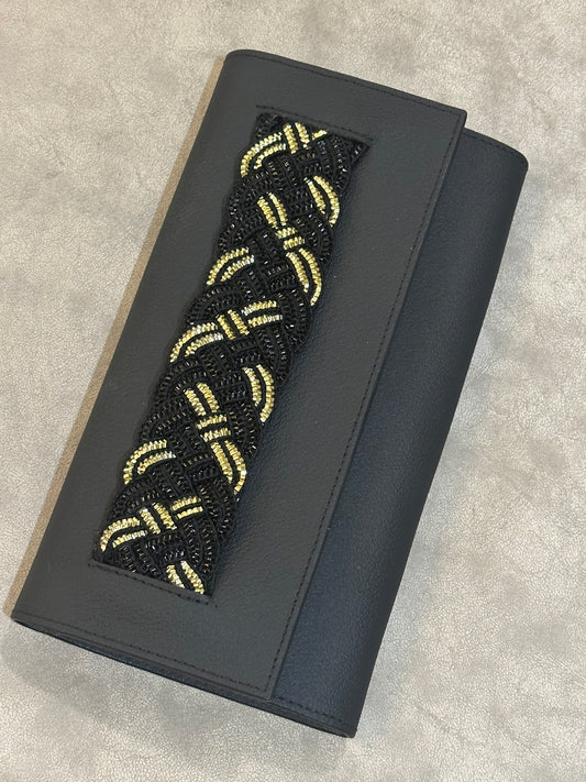 golden black clutch
